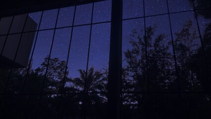 Beautiful starry night sky view from the window 
