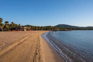 Sandy beach of Port-Grimaud, Gulf of Saint-Tropez in summer, Var, French Riviera, France