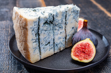 Cheese collection, piece of italian blue cheese gorgonzola picante with blue mold from north of Italy - obrazy, fototapety, plakaty