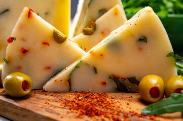 Cheese collection, fresh Italian pecorino cheese made from sheep milk filled with green olives...