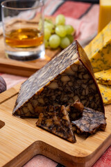 Irish brown porter cheese, blue cheese and tasting glass of single pot still whiskey from Ireland