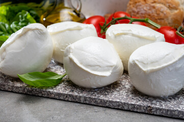 Fresh handmade soft Italian cheese from Campania, white balls of buffalo mozzarella cheese made from cow milk ready to eat