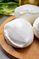 Fresh handmade soft Italian cheese from Campania, white balls of buffalo mozzarella cheese made from cow milk ready to eat