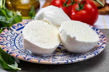 Fresh handmade soft Italian cheese from Campania, white balls of buffalo mozzarella cheese made from cow milk ready to eat