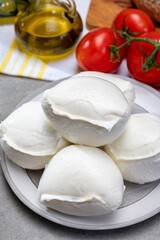 Fresh handmade soft Italian cheese from Campania, white balls of buffalo mozzarella cheese made from cow milk ready to eat