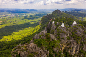 Fototapeta na wymiar Aerial view over Wat Chalermprakiat temple on the rock cliffs of Lampang, Thailand