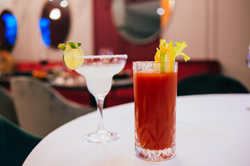 Various alcohol cocktails served on table in luxury restaurant