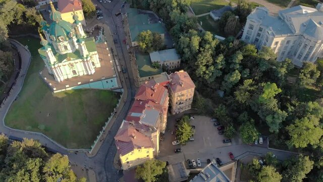 Aerial Top view to the Andreevskiy Descent and Mikhailovskiy Sobor Church at summer sunset time