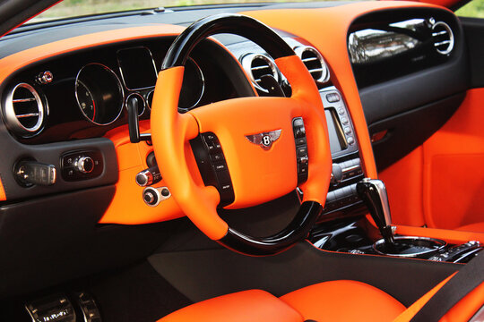 Kiev, Ukraine - April 20, 2015:  Luxurious tuned car. View of the interior of a modern automobile showing the dashboard. Car interior luxury service. Car interior details