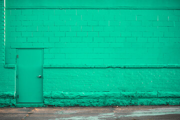 Abstract Brick Wall and Door With Room for Copy With Colorful Bright Tones in Industrial and Urban Feel