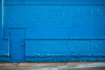 Abstract Brick Wall and Door With Room for Copy With Colorful Bright Tones in Industrial and Urban Feel
