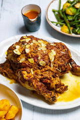 Whole roast chicken  with Indian spices and yogurt and almond masala
