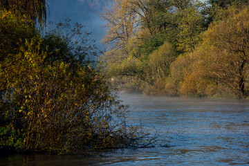 fog over the river in autumn