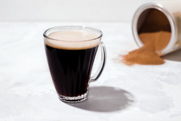 Instant black barley coffee on a light background