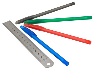 ruler and multi-colored ballpoint pens on the white