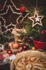 Apple pie on the table decorated in Christmas style