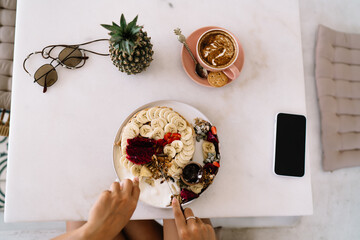 Appetizing breakfast with banana dessert and coffee