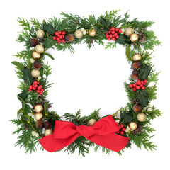 Christmas border decoration on white background with gold baubles & winter greenery of holly, ivy,...