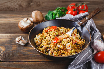 Couscous with turkey, tomatoes, champignon mushrooms and avocado.