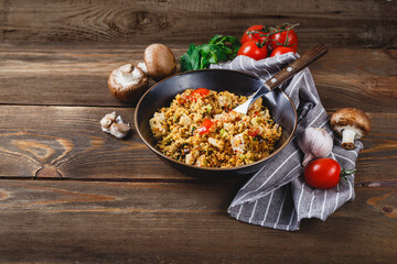 Couscous with turkey, tomatoes, champignon mushrooms and avocado.