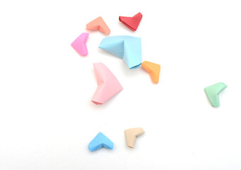 Colorful origami hearts in love