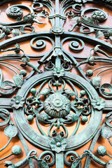 forged metal product. fragments of a forged lattice on the gate