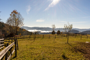 sunrise view from the mountains of Romania autumn with fog