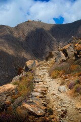 Hiking on the island of Santorini in the archipelago of the Southern Cyclades in Greece.