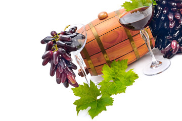 Barrel, glasses of wine and ripe grapes isolated on a white