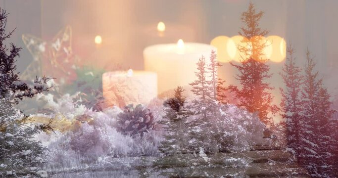 Animation of glowing lit christmas candles over winter scenery