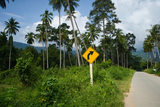 right curve traffic signs on the side of the road