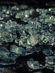 Shards of glass. The glare of the sun