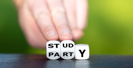 Hand turns dice and changes the word "party" to "study".