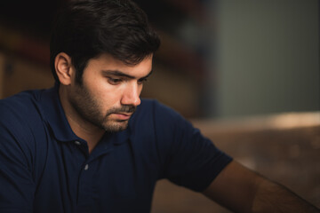 Portrait of a foreman in an international warehouse storage space, concept of business, logistics and online marketing