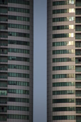 2 office buildings and the Blue Sky in the middle