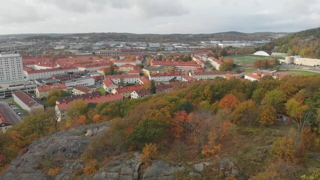 Bunkeberg Mountain and Gamlestaden, Gothenburg, Autumn Foliage, Aerial Forward