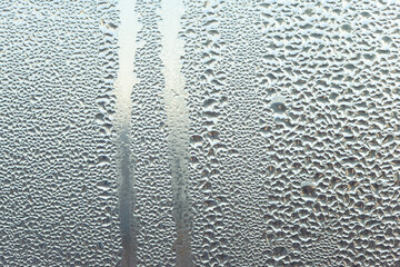 Abstract texture of water drops on glass