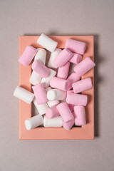 Picture of sweet pink marshmallows on an isolated background