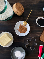 Ingredients for baking Christmas gingerbread men cookies