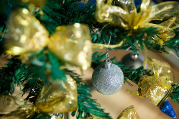 Elegant decorated with balls and figures Christmas tree