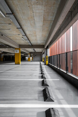 Big empty underground parking during the day