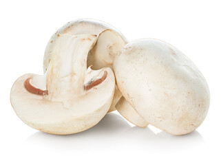 Fresh champignon mushrooms isolated on white background.