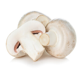 Fresh champignon mushrooms isolated on white background.