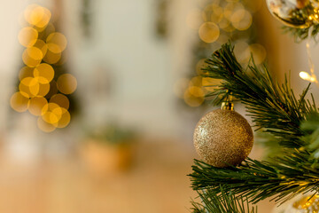 Beautiful holdiay decorated room with Christmas tree with presents under it