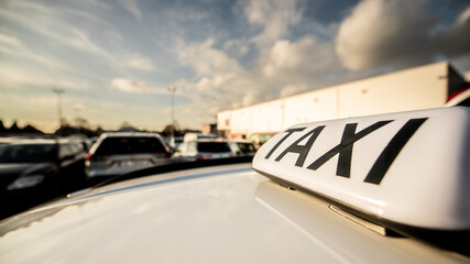 Taxi sign view the view at the parking near supermarket