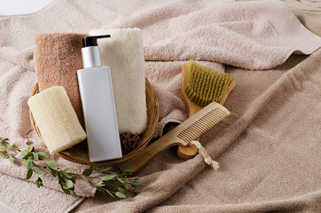 A set of ecological natural accessories for body, face, hands care. Cream, washcloth, wooden comb,...