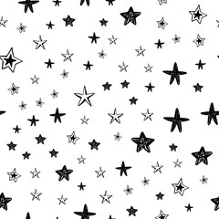 hand drawn stars seamless pattern. Doodle star texture. Sky and night background.