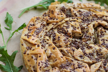 Delicious meat pie from puff pastry, which is traditionally prepared in the Balkans