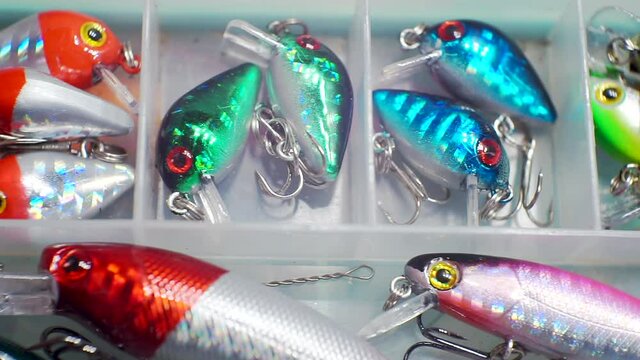 fishing box with bright crank baits designed for catching predatory fish