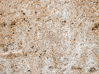 Closeup of cement ground mixed with small pebbles